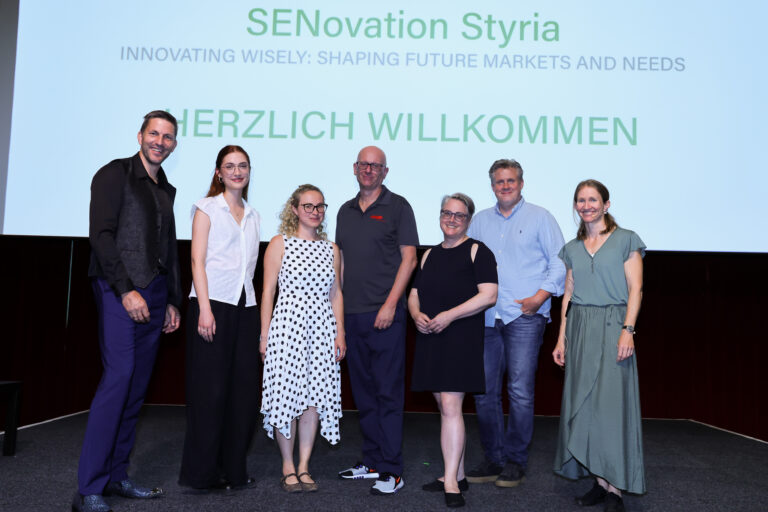Bente Knoll und weitere Speaker:innen im Gruppenbild